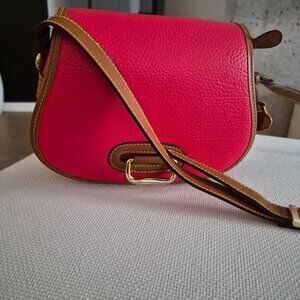 Dooney and Bourque crossbody leather bag.